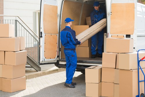 Student removal team handling boxes in a London street