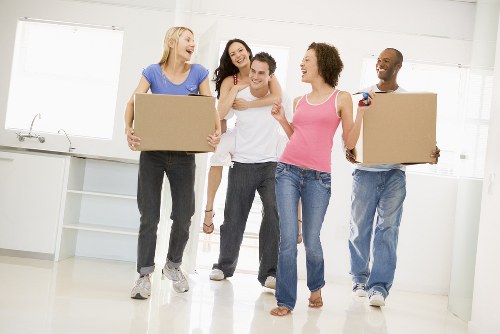 Planning home moves in London with boxes and moving van