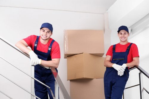 Moving van and packed boxes representing transparent removals pricing in London