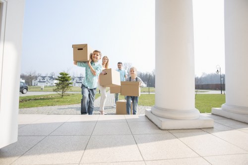 Professional London movers packing household items for relocation