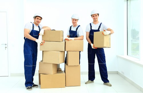 Professional movers loading furniture in London