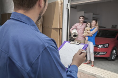 A removals crew following safe working practices during transport