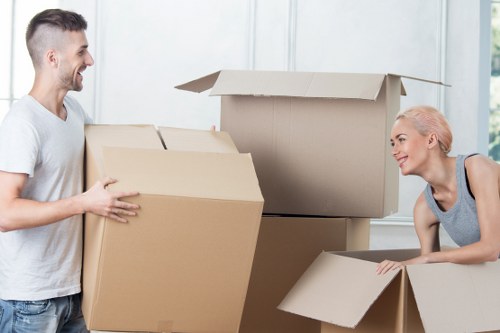 Packed storage unit in London with labelled boxes and furniture