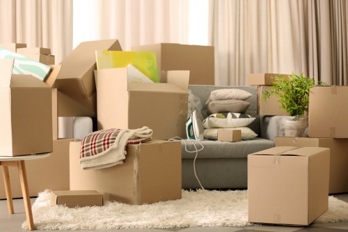Furniture removal van loaded with household items during London collection