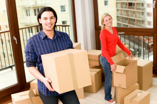 Packed moving boxes and labeled household items ready for transport