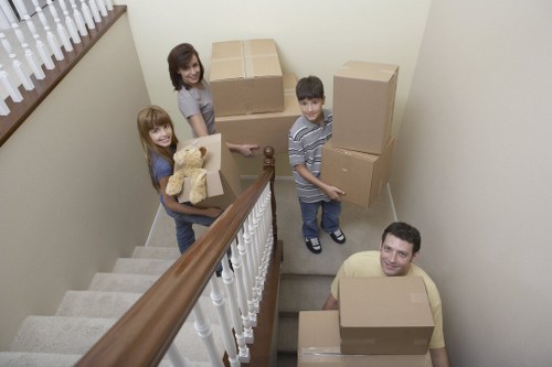 Student moving boxes with a man and van service